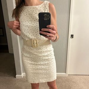 Eyelet dress. Lined. Very well made. Works with or without the belt.